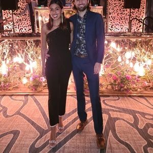 Black jumpsuit with sequined bow from Neiman Marcus